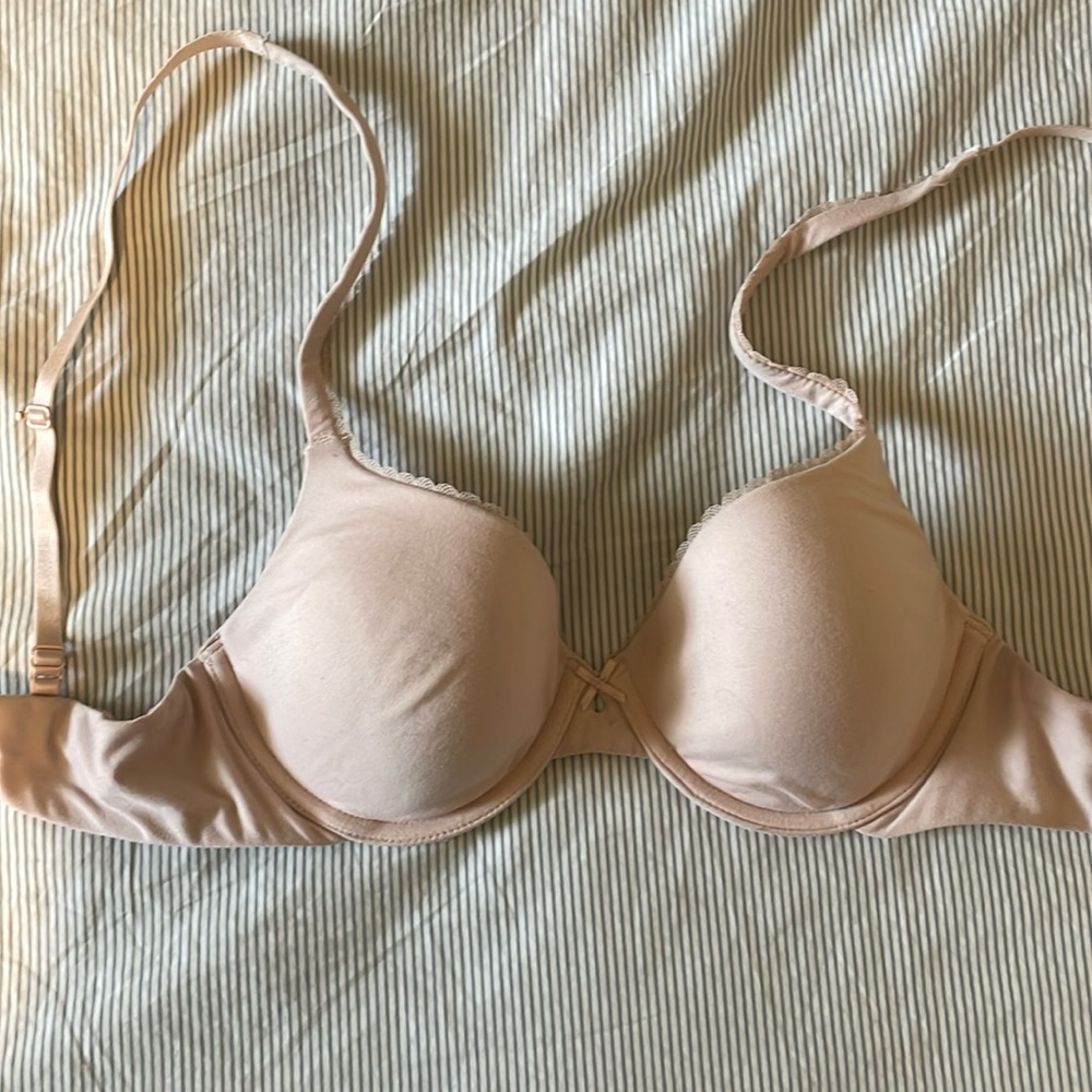 Paramour 32D light pink bra with lace detail, convertible to racerback